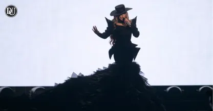 Eurovision 2025 finalists performing live on stage with vibrant lights and costumes