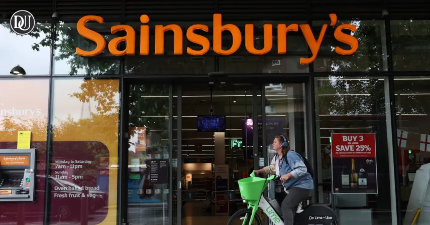 Sainsbury's clothing section without changing rooms, customers browsing apparel