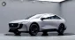 Mazda EZ-6 Sports Edition electric sedan with black wheels and sporty design