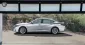 Luxury hybrid car parked with sleek design and eco-friendly styling